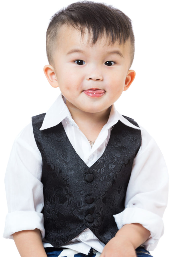 Little boy with tongue sticking out